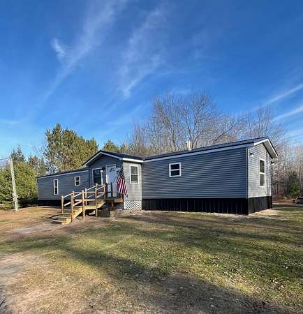 10 Acres of Recreational Land with Home for Sale in Beaverton, Michigan