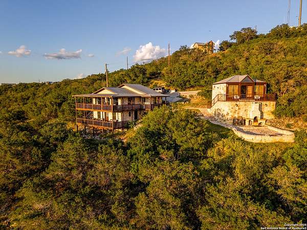 2 Acres of Residential Land with Home for Sale in Concan, Texas