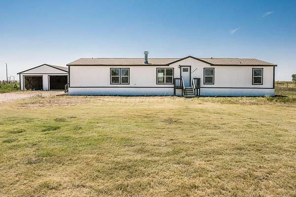 2.59 Acres of Residential Land with Home for Sale in Canyon, Texas