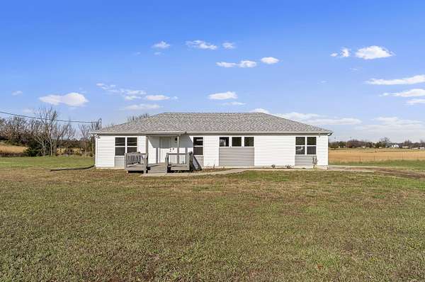 10 Acres of Land with Home for Sale in Pleasant Hope, Missouri
