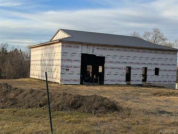 3.12 Acres of Residential Land with Home for Sale in Goodrich, Michigan