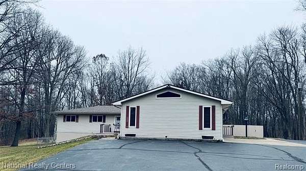 7.3 Acres of Residential Land with Home for Sale in Davisburg, Michigan