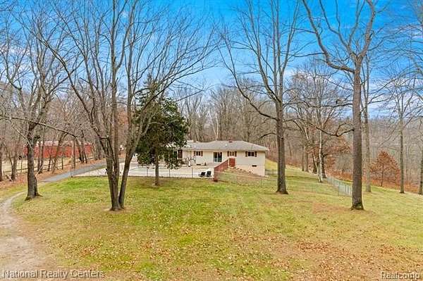 7.3 Acres of Land with Home for Sale in Springfield Township, Michigan