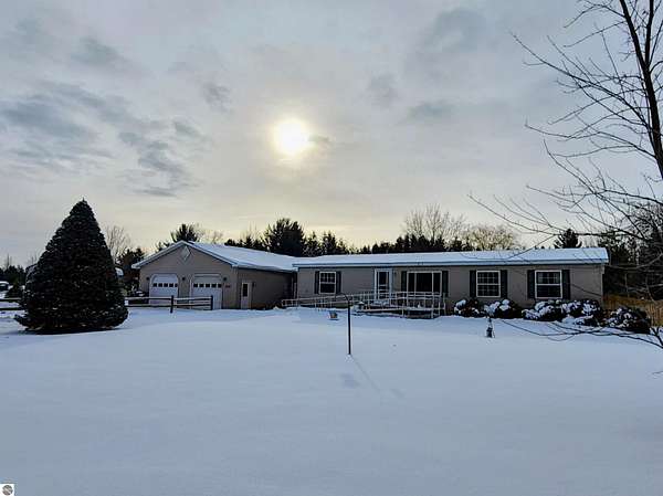 4.88 Acres of Residential Land with Home for Sale in Kalkaska, Michigan