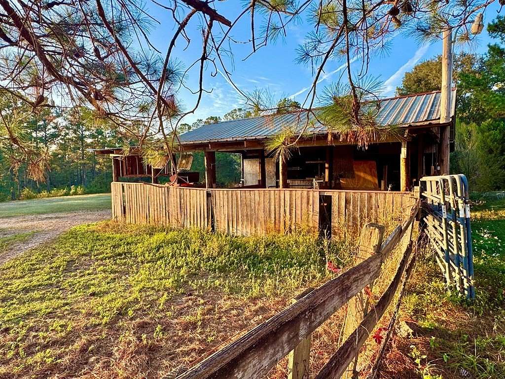 23.6 Acres of Land with Home for Sale in Cairo, Georgia