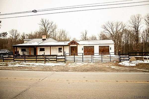 5 Acres of Land with Home for Sale in Acme, Pennsylvania