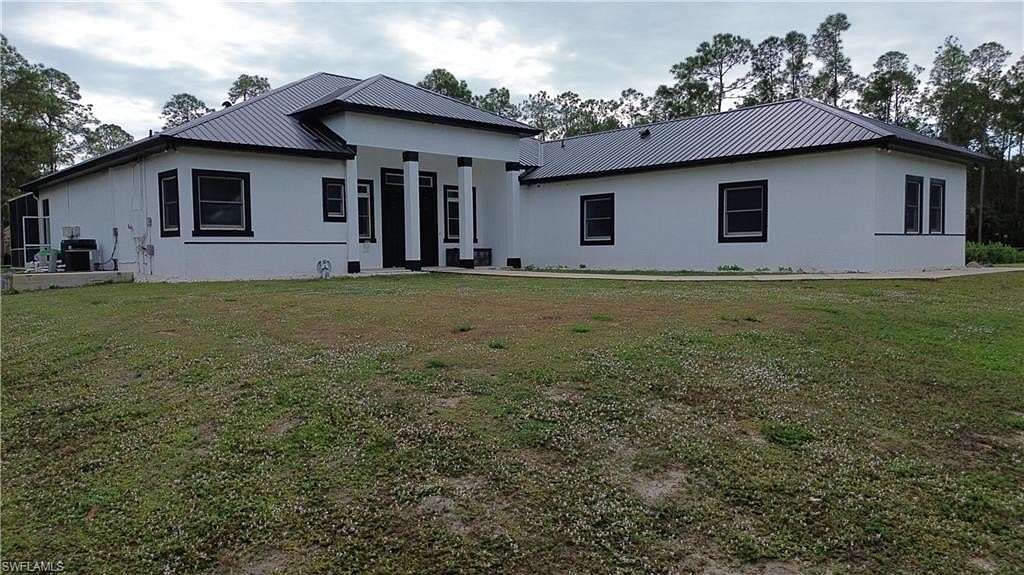 2.5 Acres of Residential Land with Home for Sale in Naples, Florida