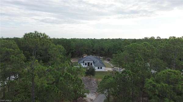 2.5 Acres of Residential Land with Home for Sale in Naples, Florida