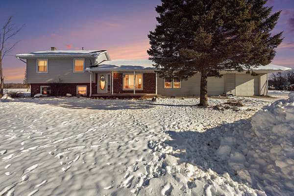 5.14 Acres of Residential Land with Home for Sale in Coleman, Michigan