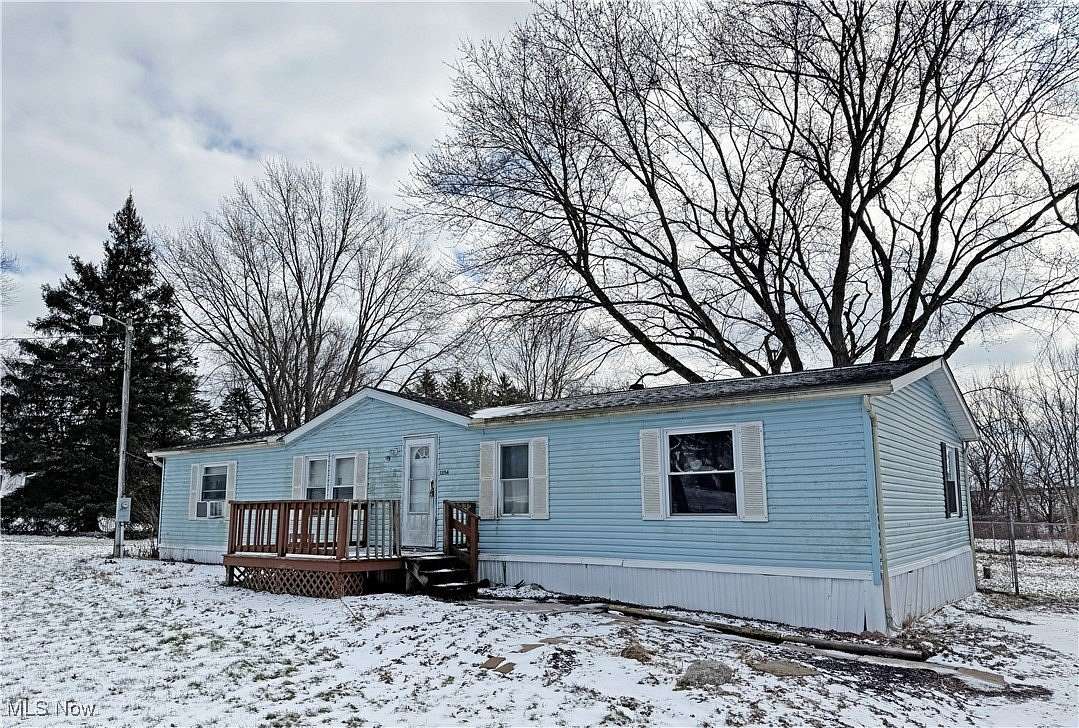 1.64 Acres of Residential Land with Home for Sale in Massillon, Ohio