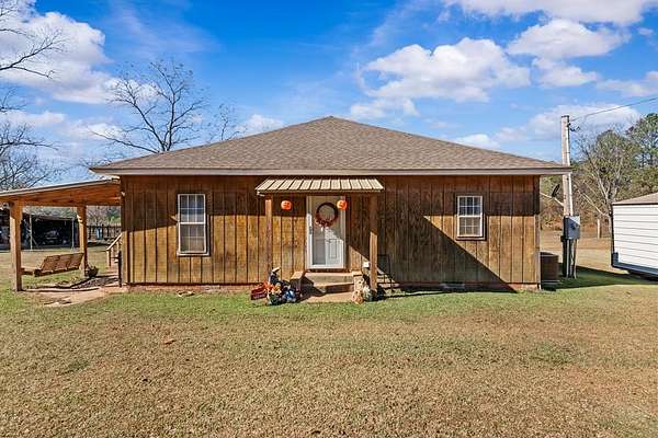 7.7 Acres of Land with Home for Sale in Andalusia, Alabama