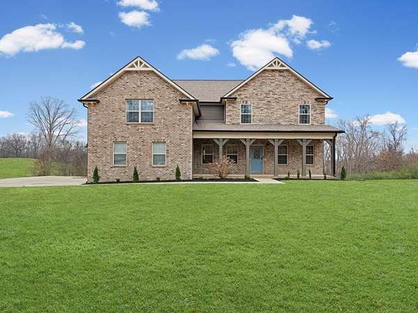 1.53 Acres of Residential Land with Home for Sale in Cunningham, Tennessee