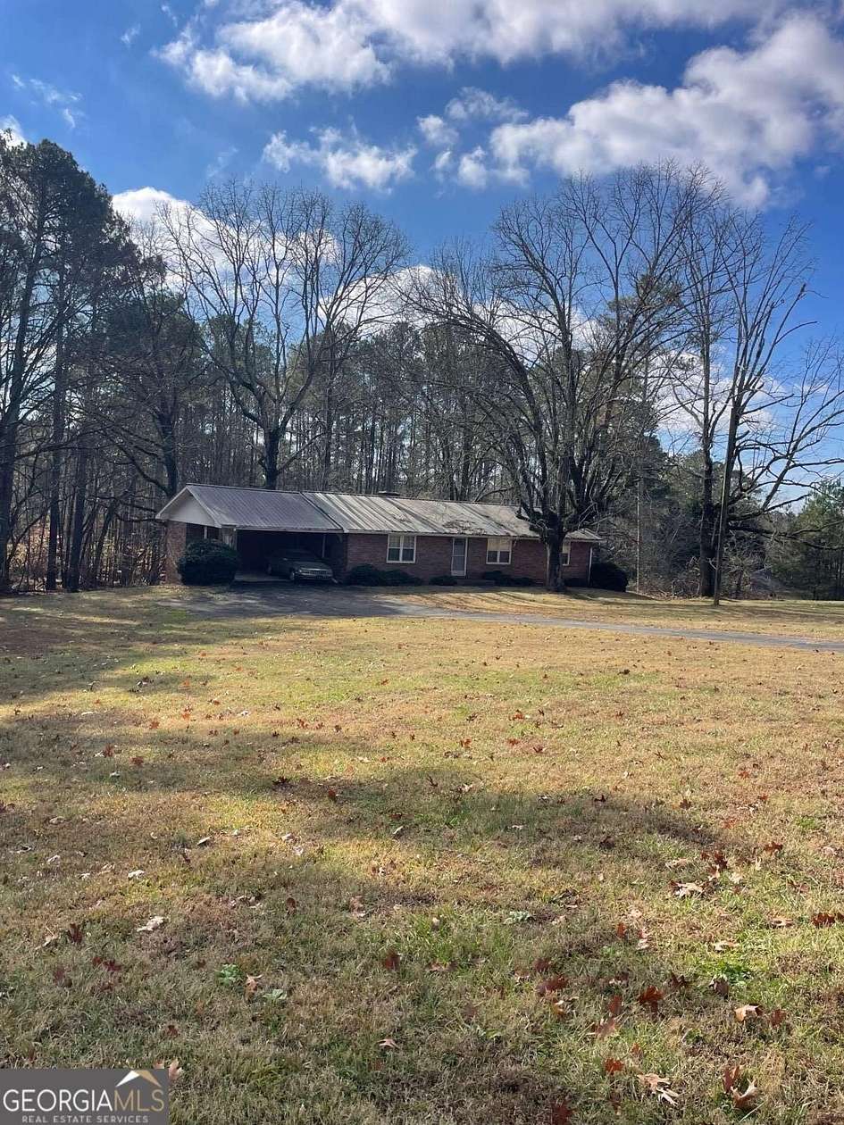 2.85 Acres of Residential Land with Home for Sale in Alpharetta, Georgia