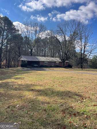 2.85 Acres of Residential Land with Home for Sale in Alpharetta, Georgia