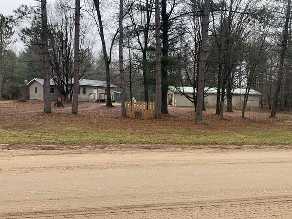 10 Acres of Residential Land with Home for Sale in Luther, Michigan