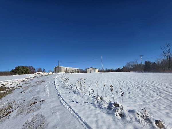 79.9 Acres of Recreational Land with Home for Sale in Stanton, Michigan