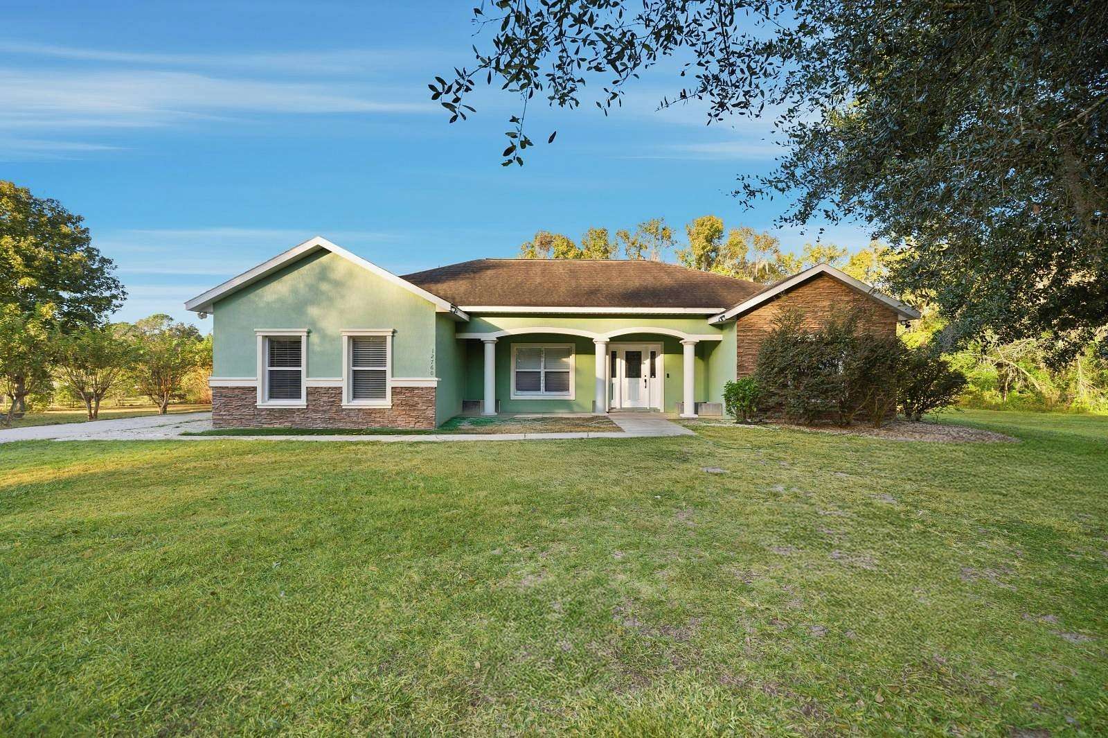 2.33 Acres of Land with Home for Sale in Belleview, Florida