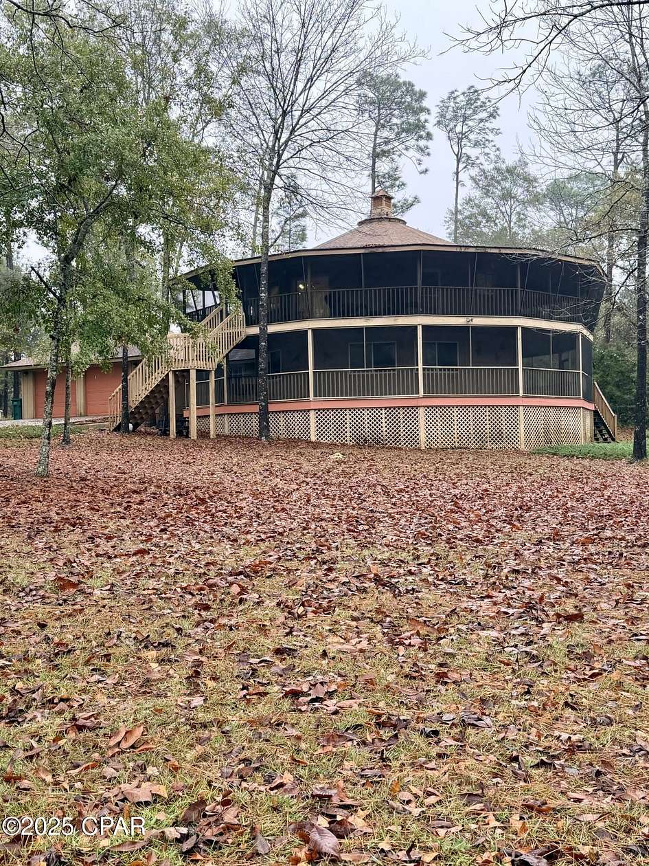 1.76 Acres of Residential Land with Home for Sale in Marianna, Florida