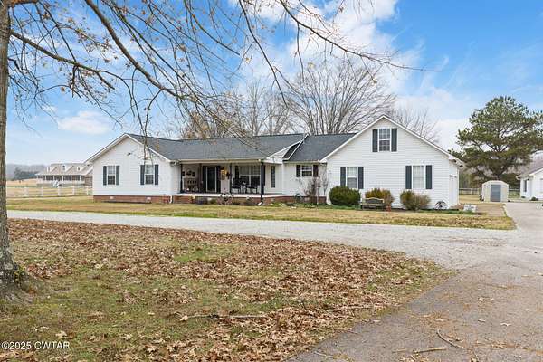 5.43 Acres of Residential Land with Home for Sale in Huron, Tennessee