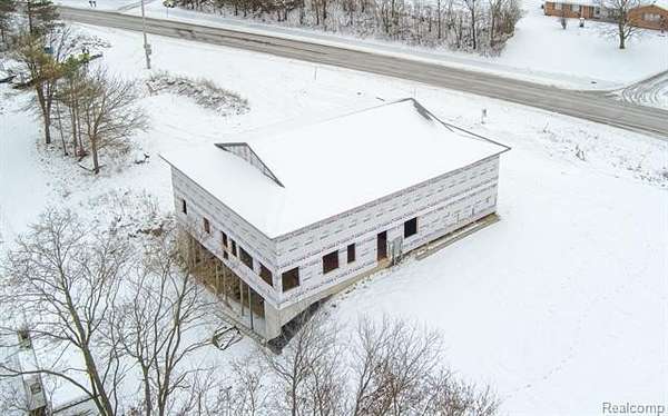 3.12 Acres of Residential Land with Home for Sale in Goodrich, Michigan