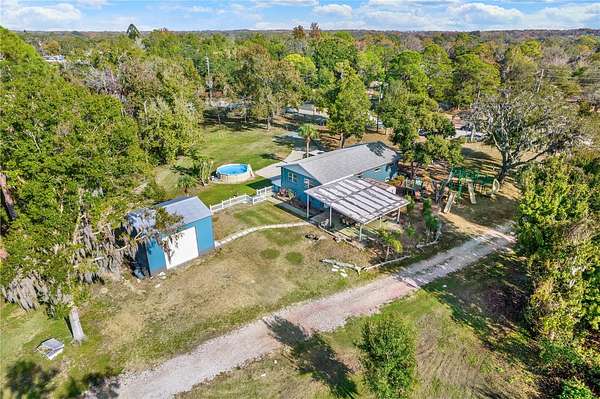 12.8 Acres of Land with Home for Sale in New Port Richey, Florida