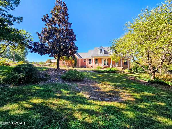 31.5 Acres of Agricultural Land with Home for Sale in Jackson, Tennessee