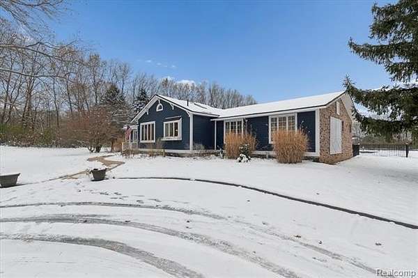 5.25 Acres of Land with Home for Sale in Putnam Township, Michigan