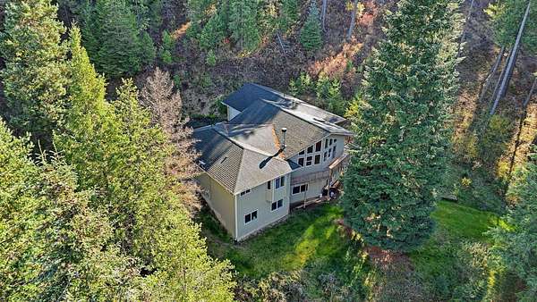 12.3 Acres of Land with Home for Sale in Chattaroy, Washington