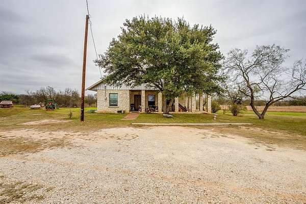 6 Acres of Residential Land with Home for Sale in Blum, Texas