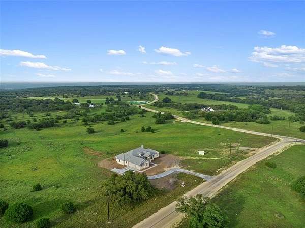 12.2 Acres of Land with Home for Sale in Briggs, Texas