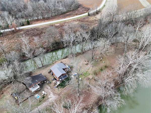 12.8 Acres of Land with Home for Sale in Morgantown, Kentucky