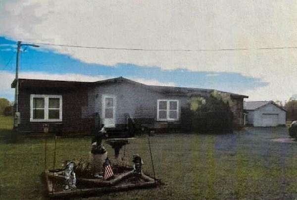 5 Acres of Residential Land with Home for Sale in Custer, Michigan