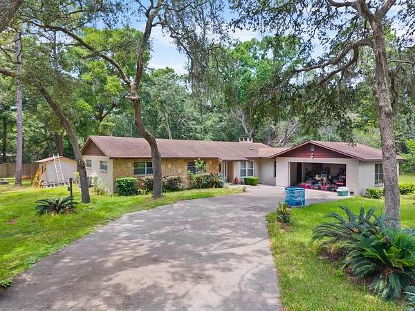 2 Acres of Residential Land with Home for Sale in Chiefland, Florida