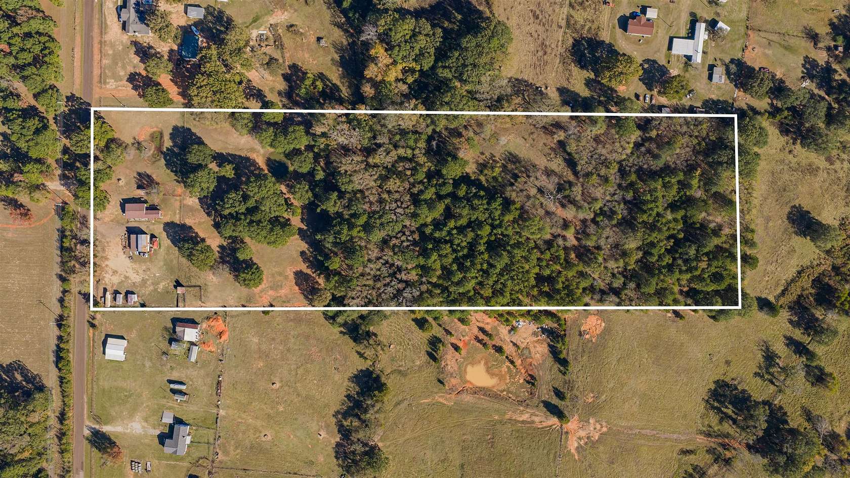 12.2 Acres of Land with Home for Sale in Winona, Texas