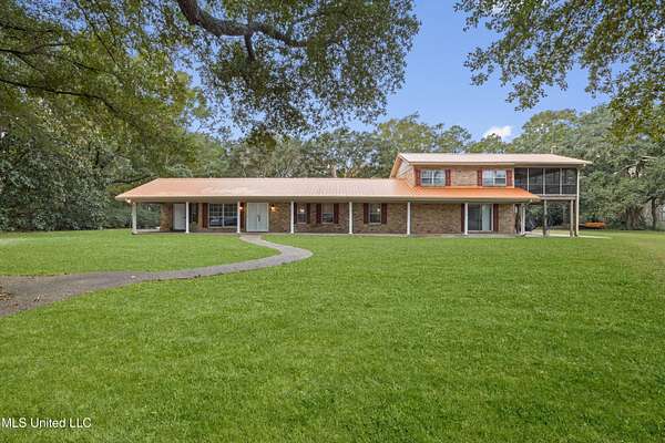 4.4 Acres of Residential Land with Home for Sale in Gautier, Mississippi