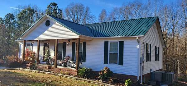 4.63 Acres of Residential Land with Home for Sale in Leoma, Tennessee