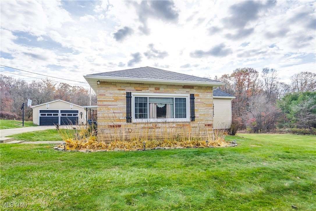 6.76 Acres of Residential Land with Home for Sale in East Sparta, Ohio