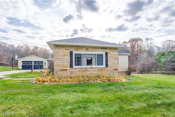 6.76 Acres of Residential Land with Home for Sale in East Sparta, Ohio