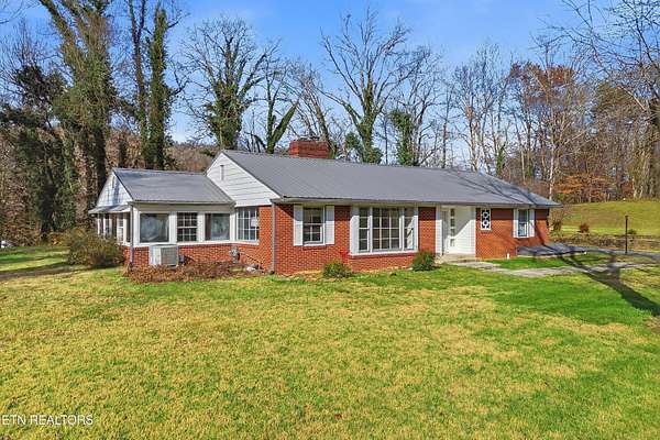 2.2 Acres of Residential Land with Home for Sale in Rocky Top, Tennessee