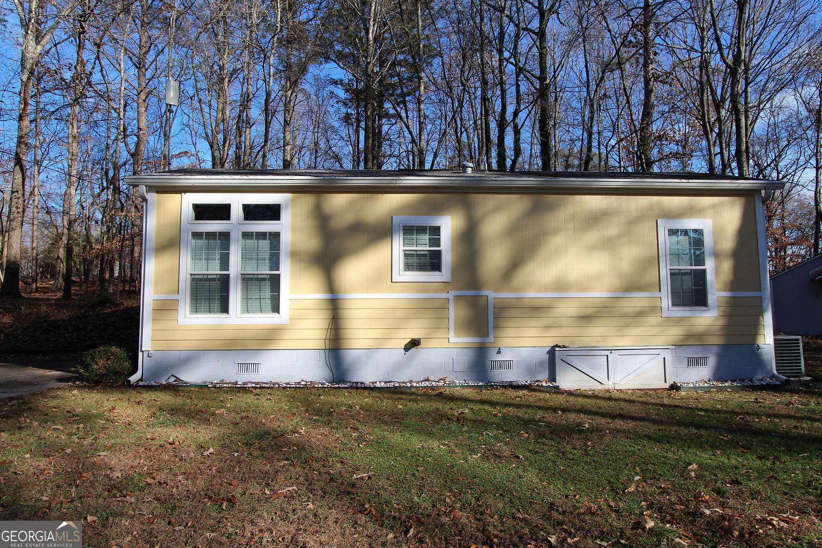 1.1 Acres of Residential Land with Home for Sale in Cumming, Georgia