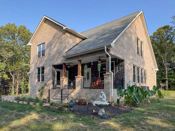 10 Acres of Land with Home for Sale in Bon Aqua, Tennessee