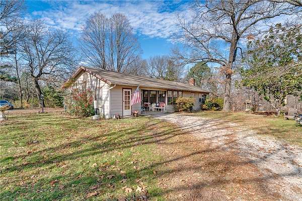 4.28 Acres of Land with Home for Sale in Gravette, Arkansas