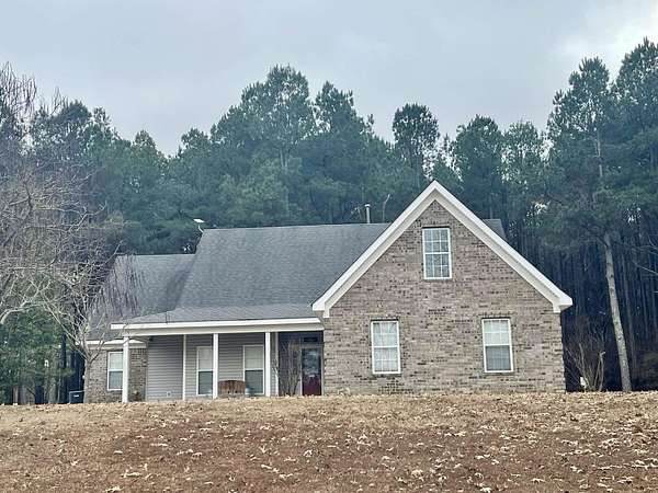 5.23 Acres of Residential Land with Home for Sale in Mason, Tennessee
