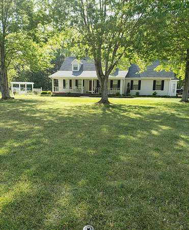 9.13 Acres of Land with Home for Sale in Spruce Pine, Alabama