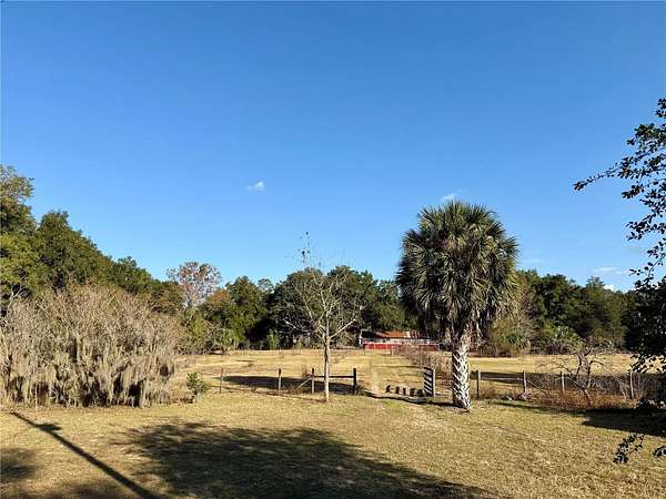 10.8 Acres of Land with Home for Sale in Melrose, Florida
