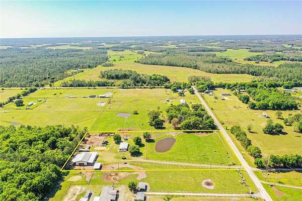 5 Acres of Residential Land with Home for Sale in Polk City, Florida