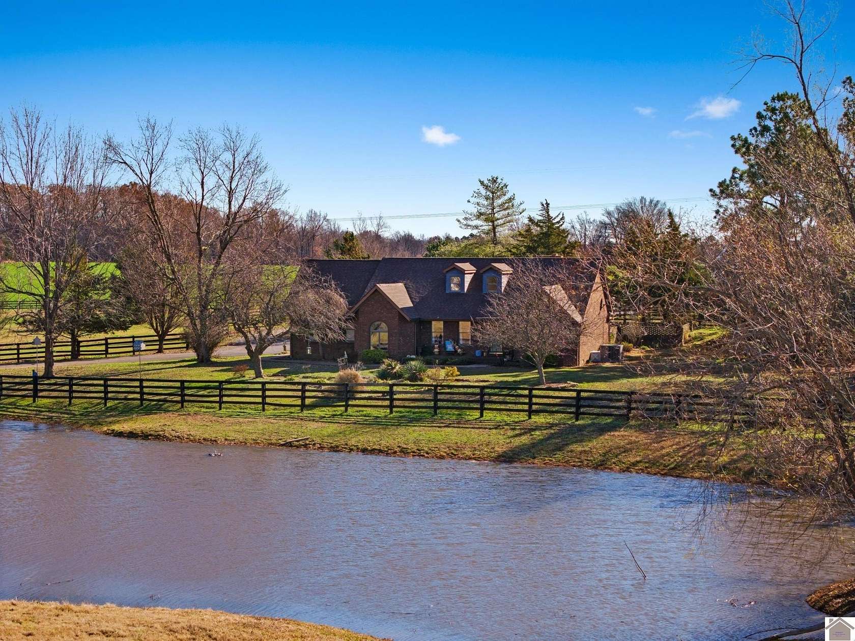 9.56 Acres of Land with Home for Sale in Kevil, Kentucky