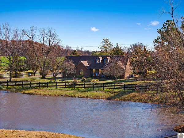 9.56 Acres of Land with Home for Sale in Kevil, Kentucky