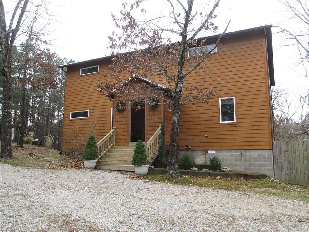 4.25 Acres of Residential Land with Home for Sale in Eureka Springs, Arkansas