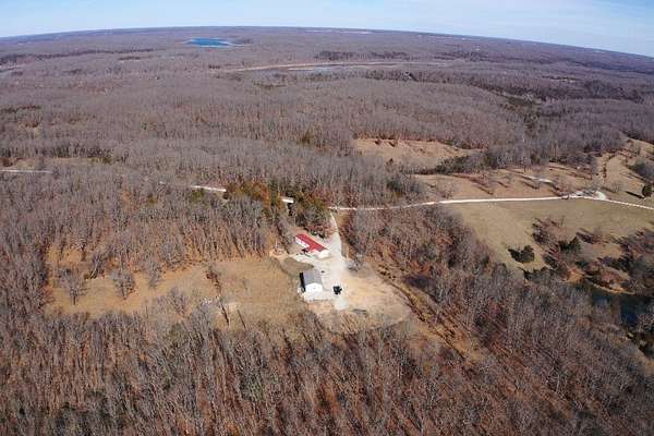 80 Acres of Recreational Land with Home for Sale in Wheatland, Missouri